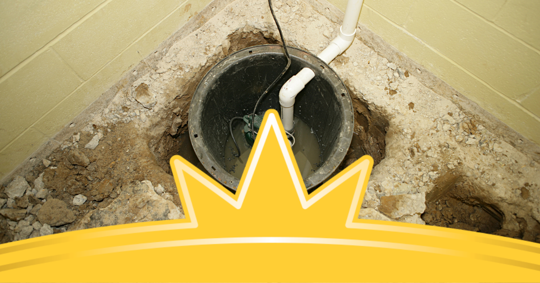 Sump pump in a basement well with pipes and electrical cords visible.